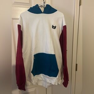 Betty’s eddies White Hoodie with Red Sleeves and Blue Pocket